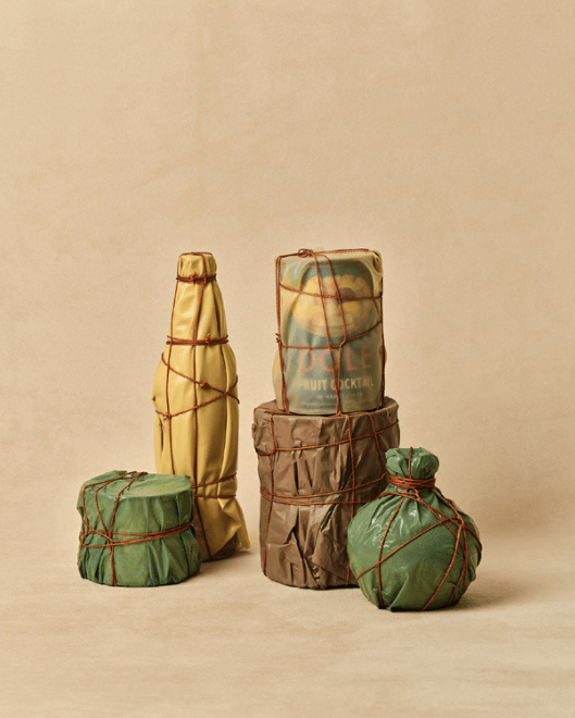 fruit cans wrapped in plastic