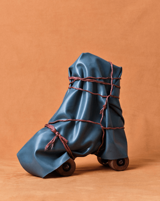 Roller skate wrapped in plastic